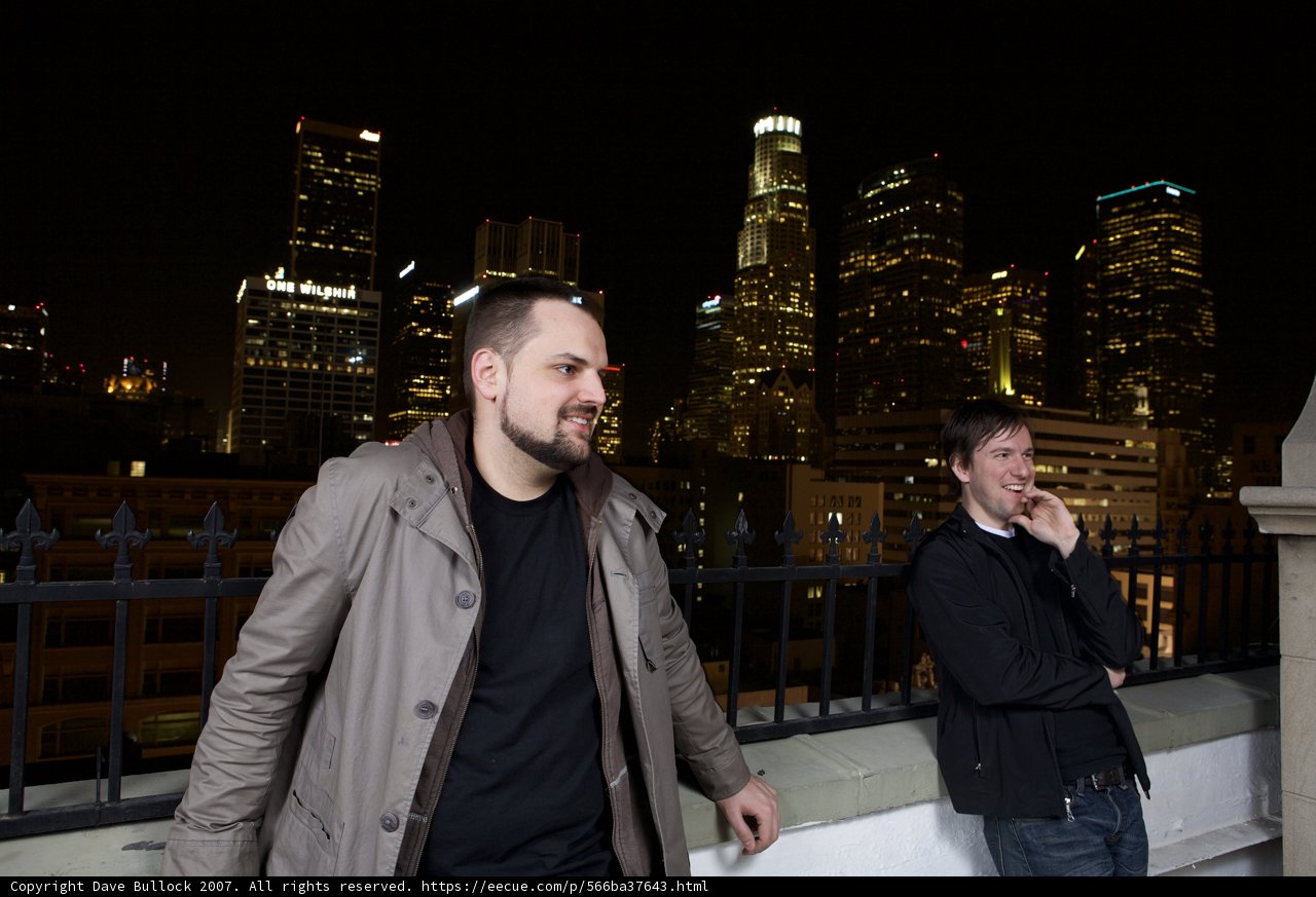 Cityscape Night View With Two Men
