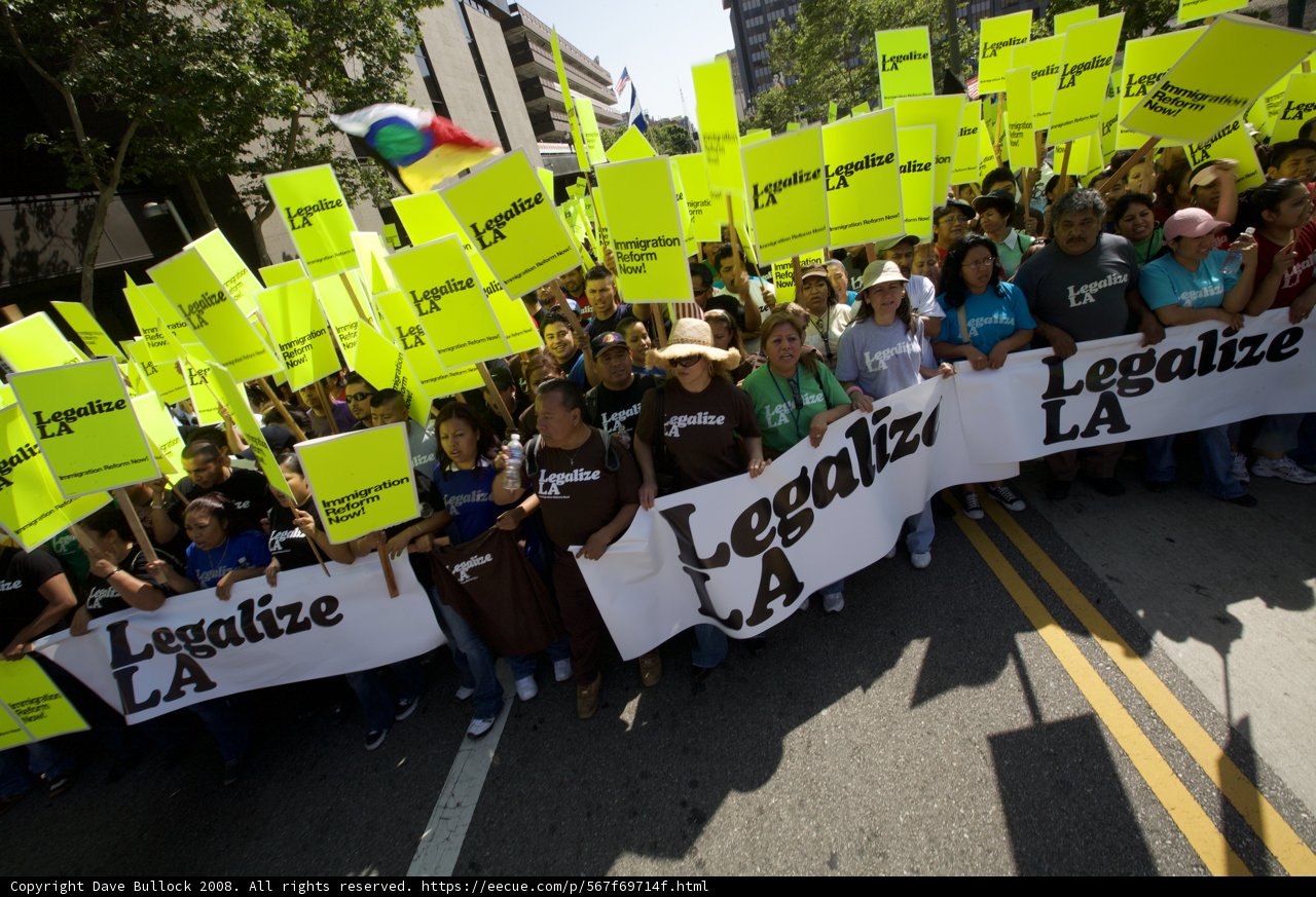 Mayday Protesters Demand Change with Signs and Banners