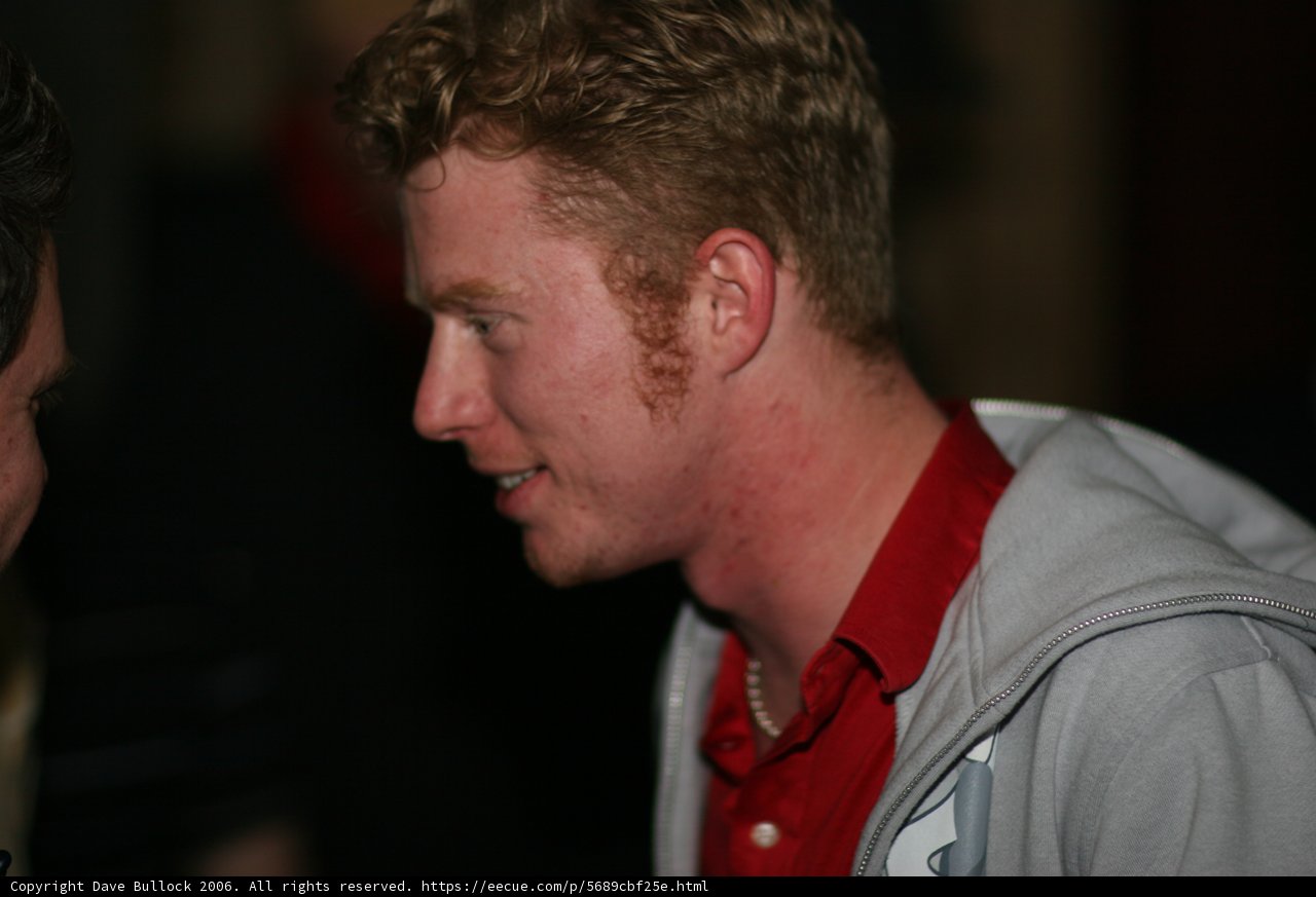 Red Shirted Man with a Smile