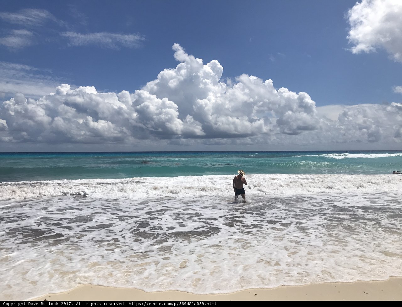 Surfer in the Cumulus Clouds