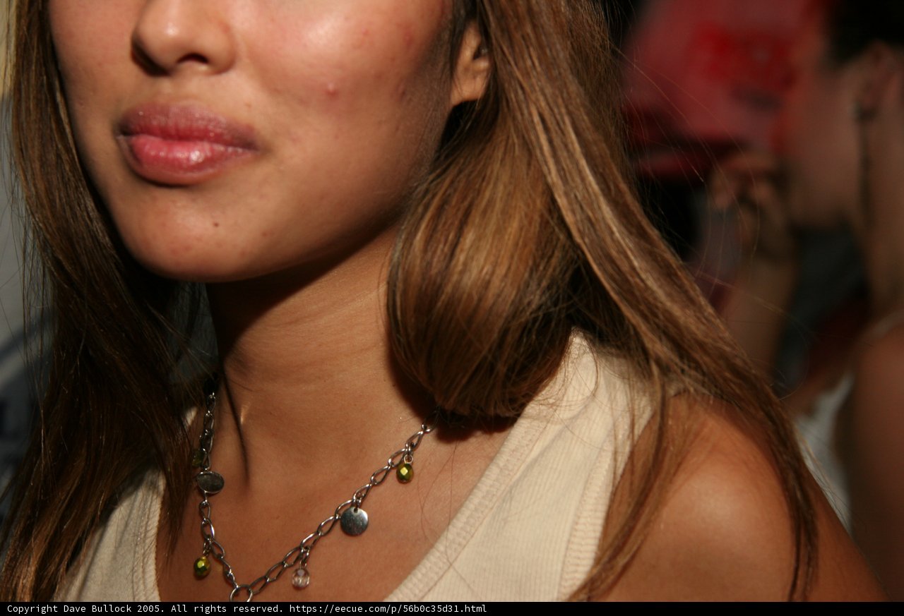 Brown-Haired Woman with a Stunning Necklace