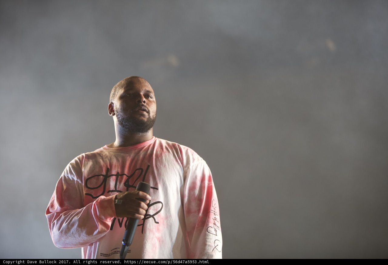 ScHoolboy Q rocks the stage in a pink T-Shirt