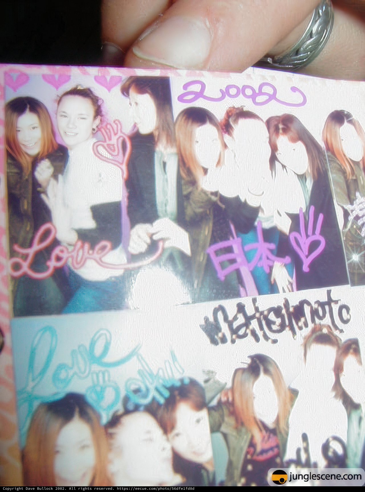 Yuka Kinoshita Holding an Advertisement Sticker with People Pictures