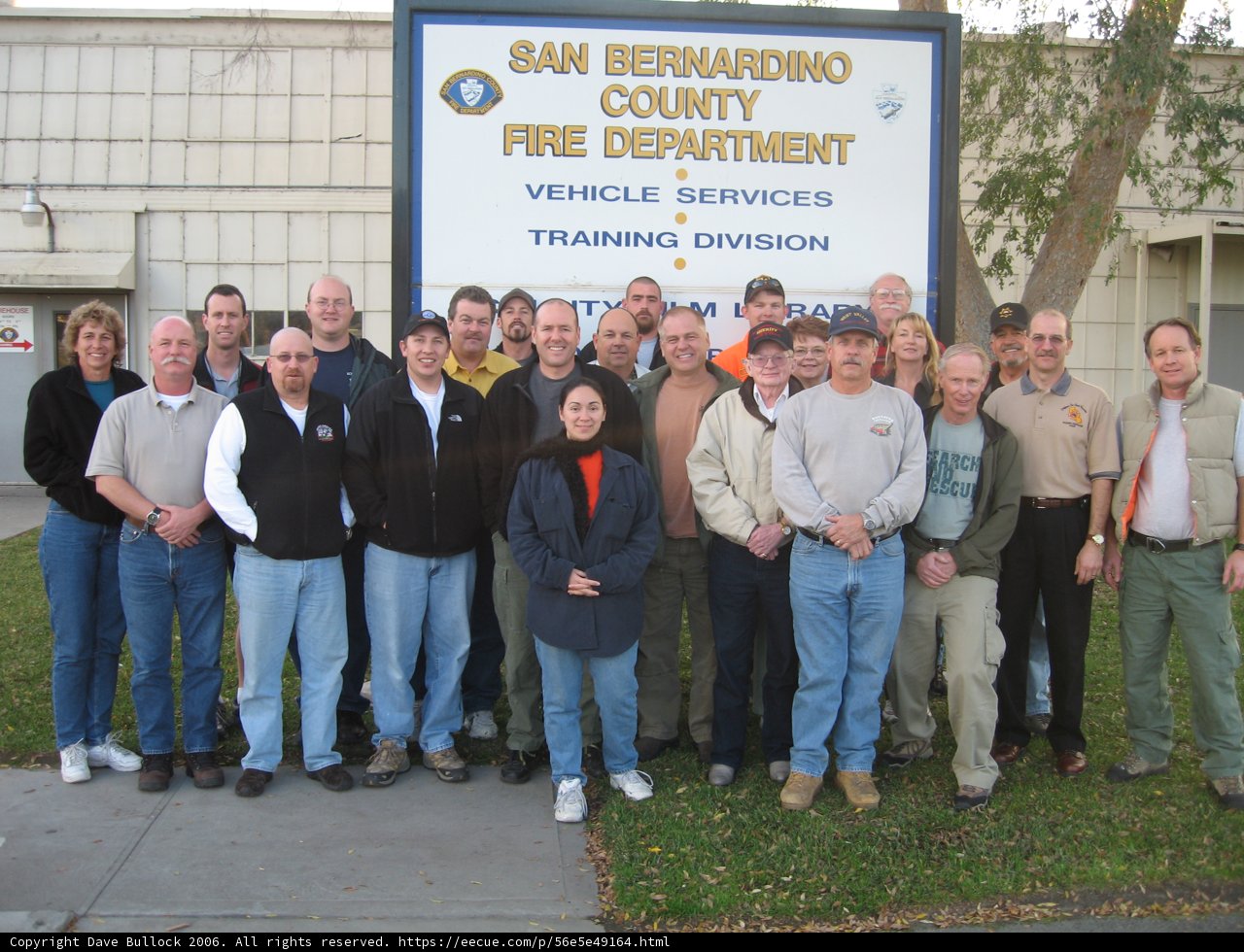 Group of 22 Poses in Front of ICS 300 Sign