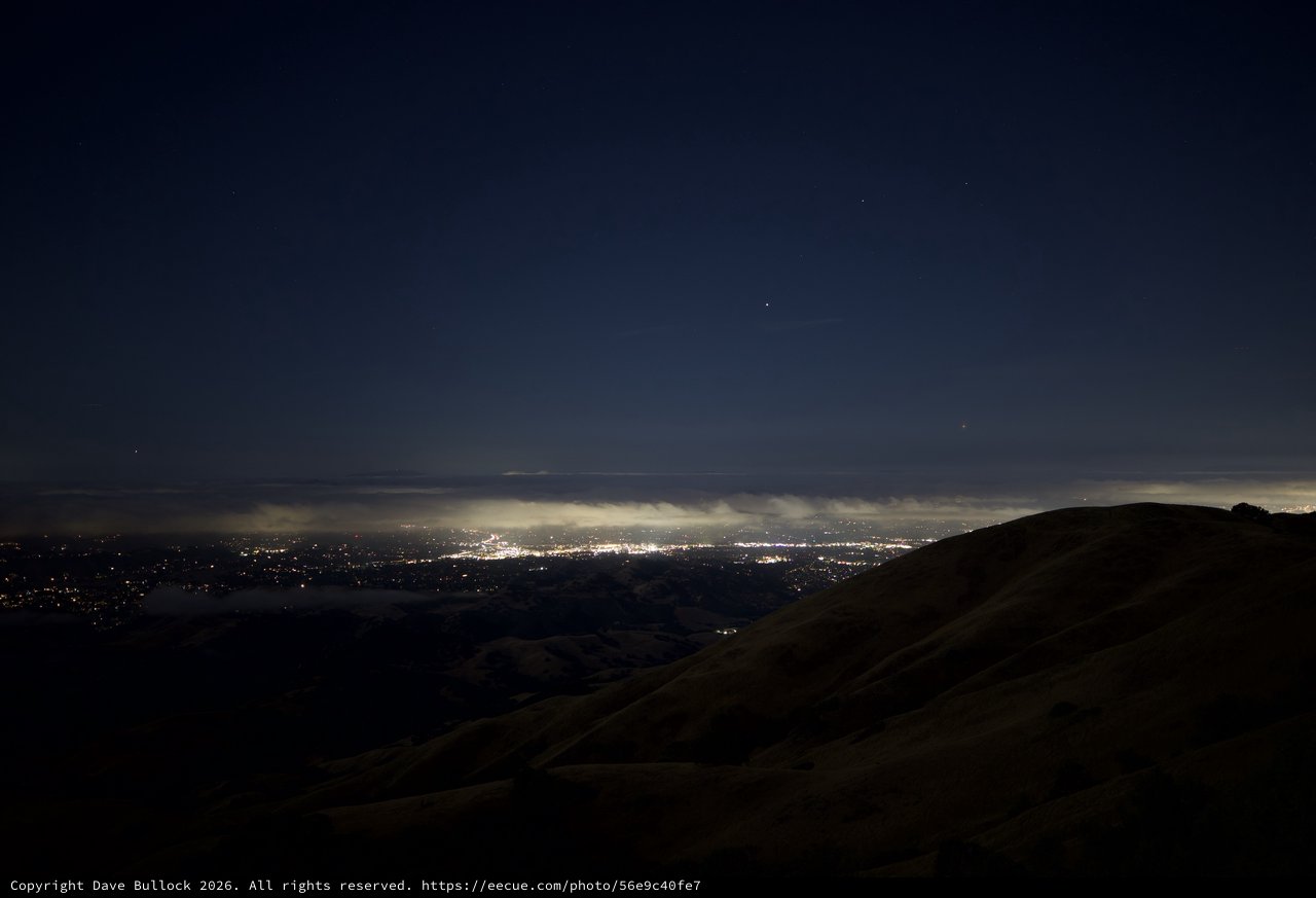 City Lights Glowing Beneath Clouds from Mount Diablo
