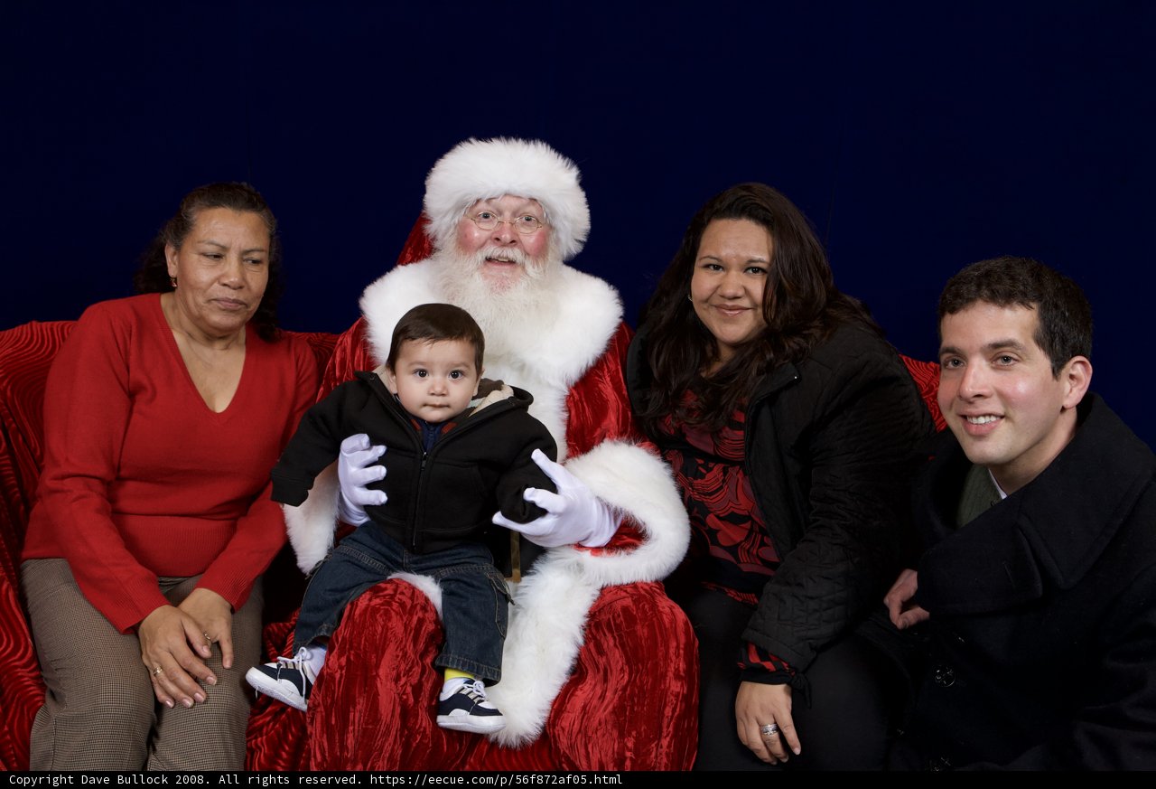 A Festive Family Portrait with Santa Claus