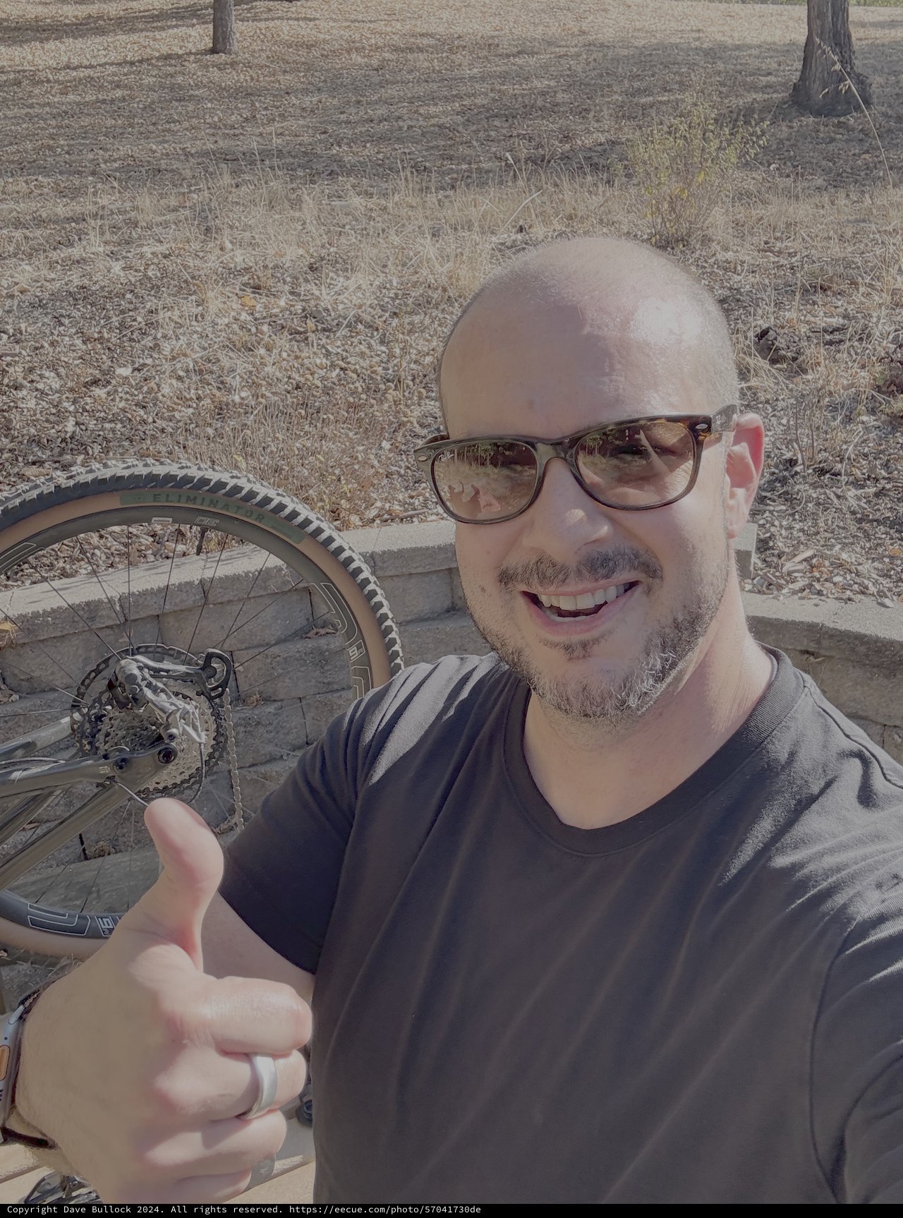 Cyclist Taking Thumbs Up Selfie Outdoors