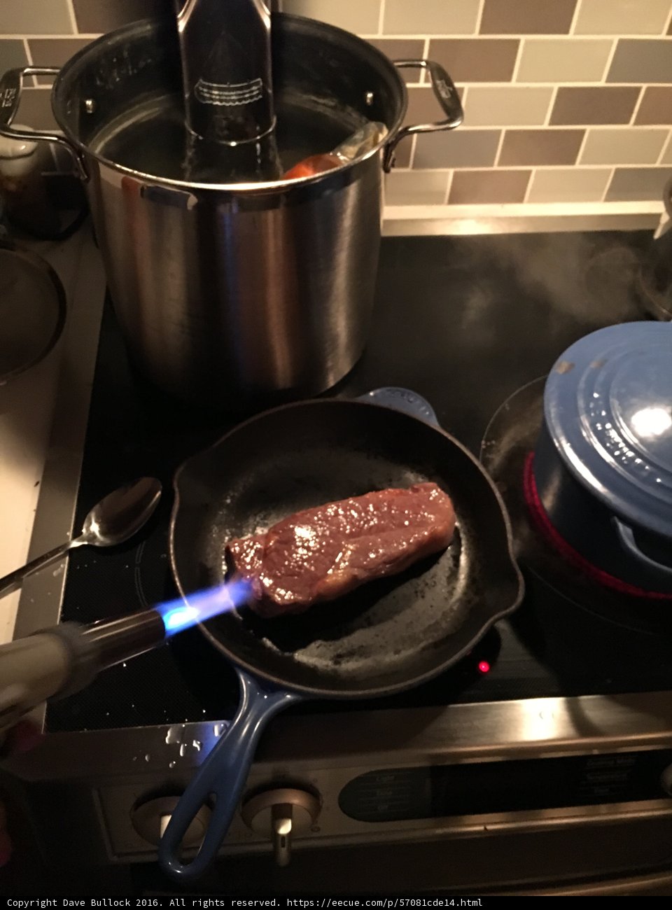 Sizzling Steak on a Cooking Pan