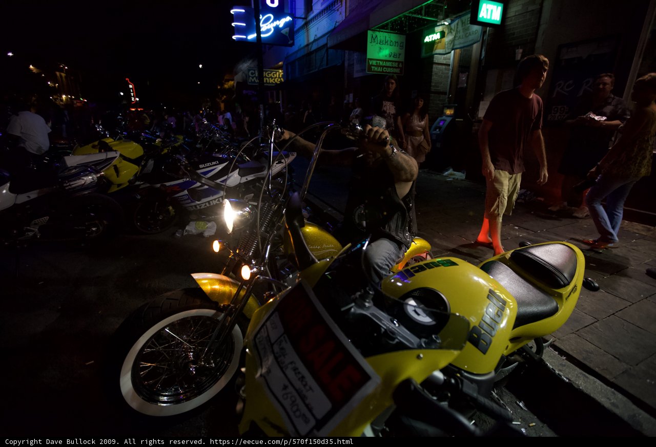Yellow Motorcycle Parked on Austin Street