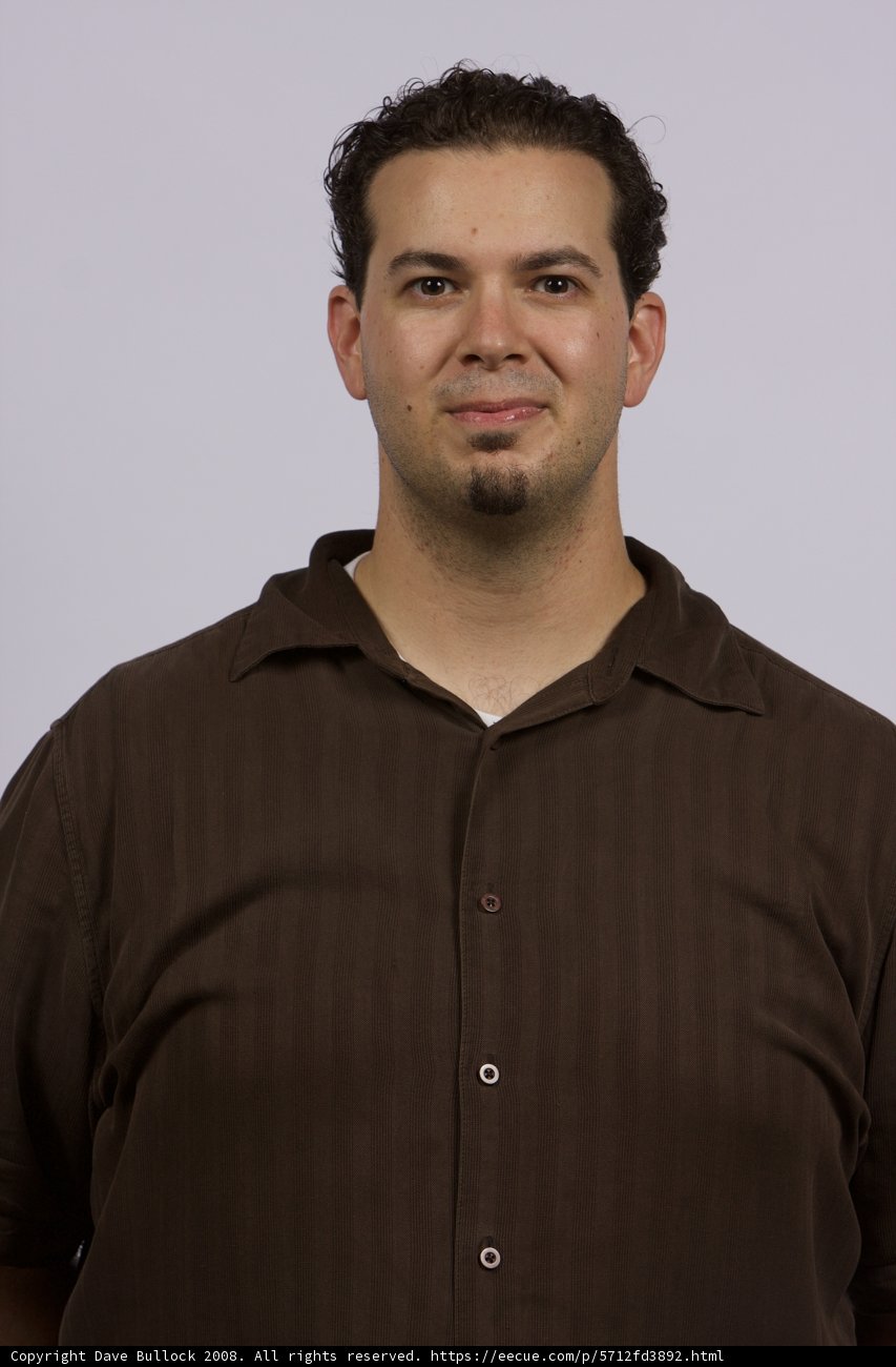 Brown Shirted Man at the 2008 APC Office
