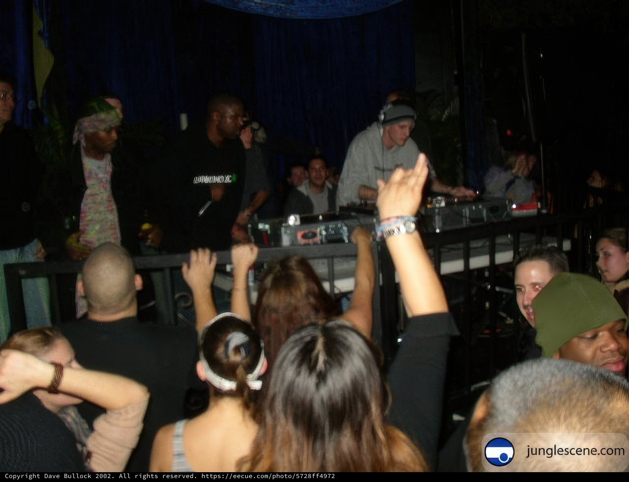 Night Club Scene with DJ's and a Crowd