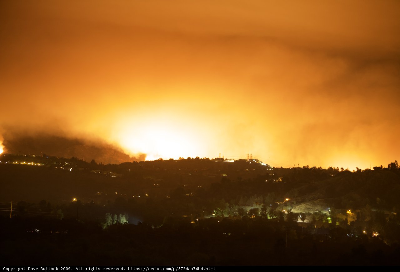 Nighttime Blaze on the Hill
