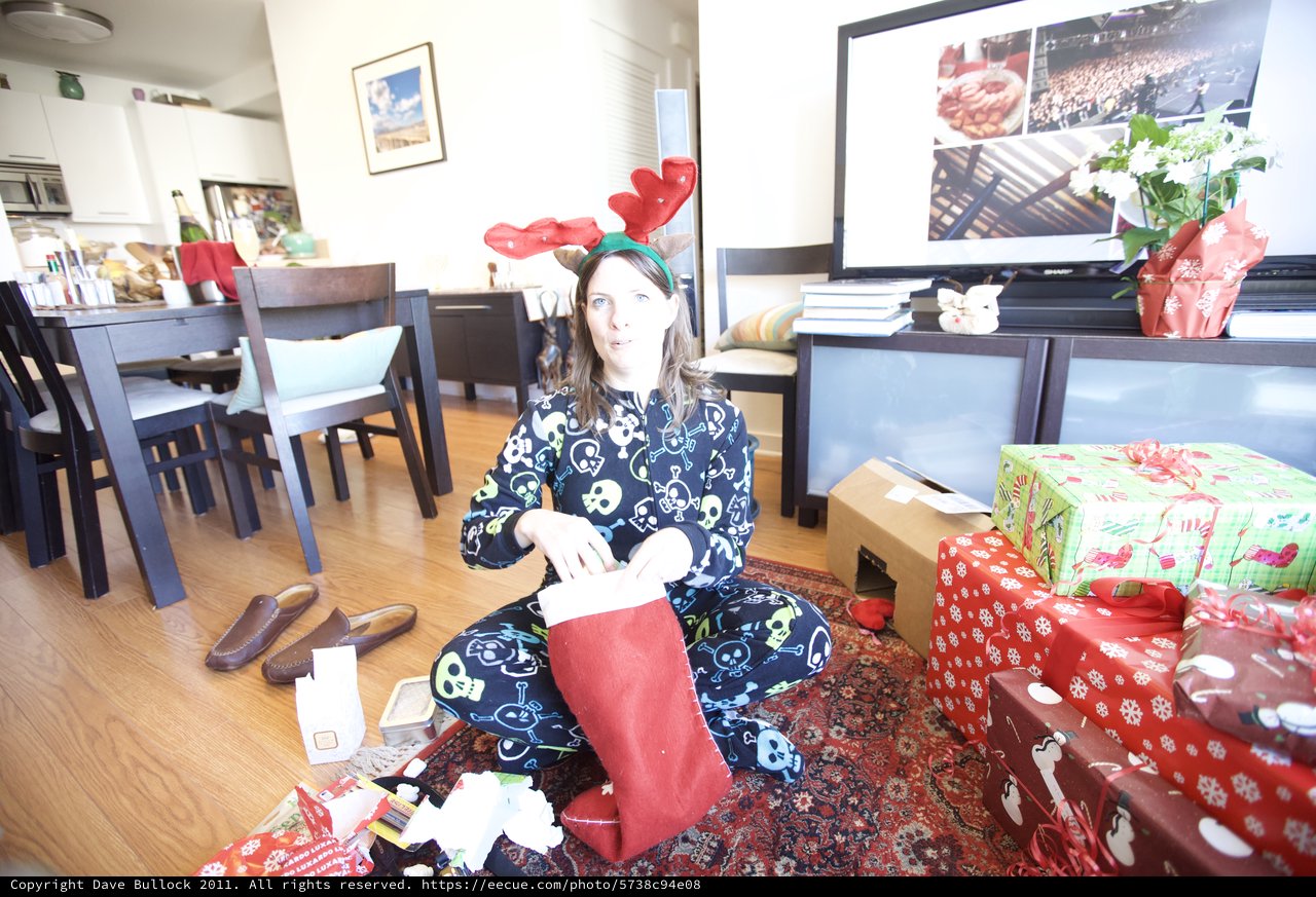 Christmas Morning Stocking Surprise in Festive Pajamas