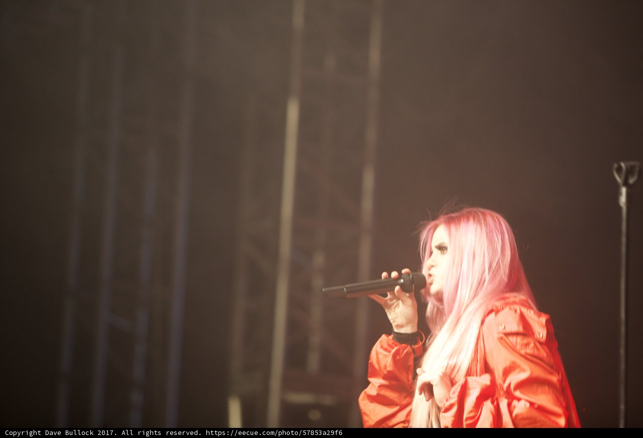 Pink-haired Woman Rocks the Stage