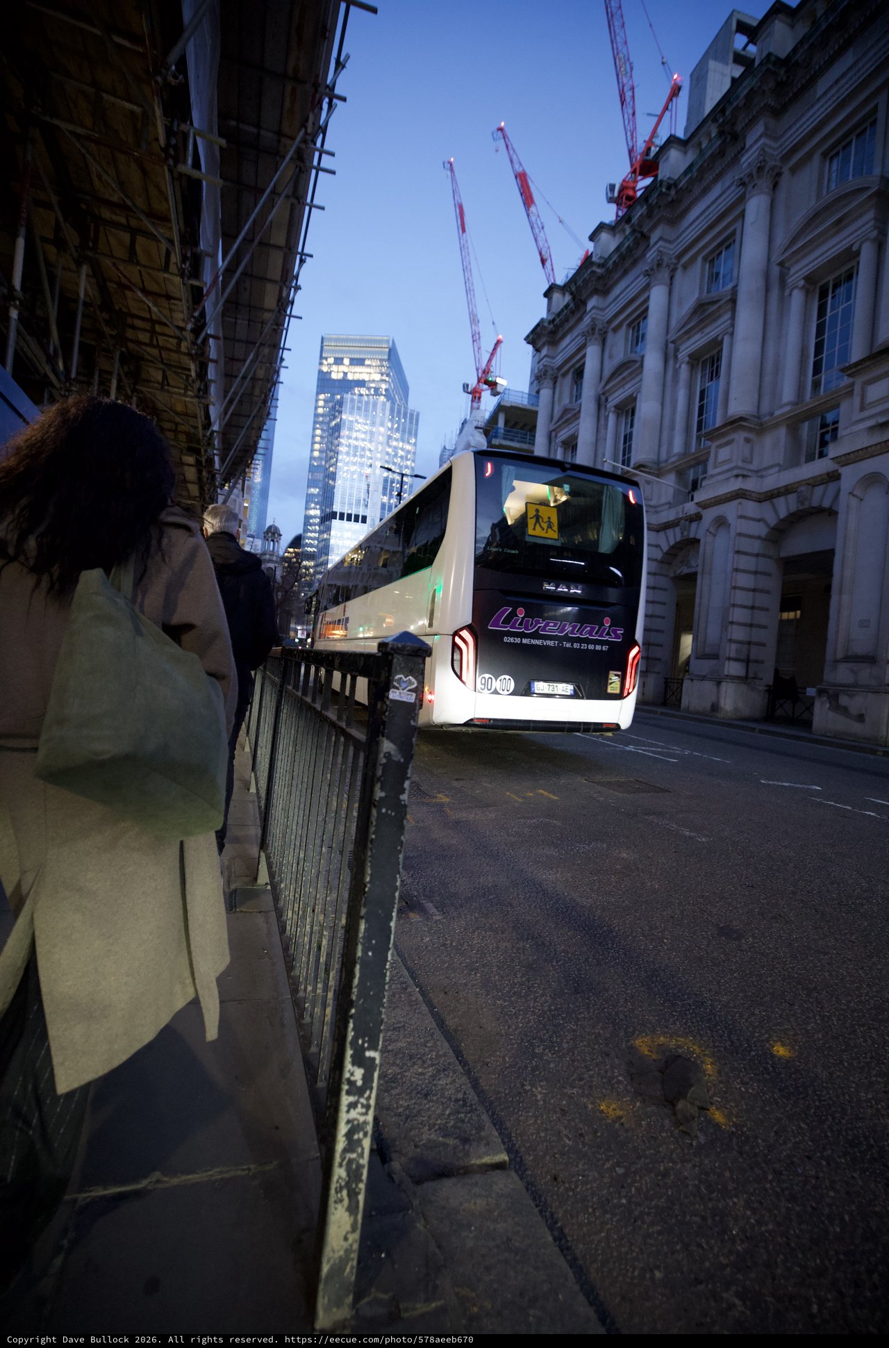 Evening Bus on London City Street at Dusk