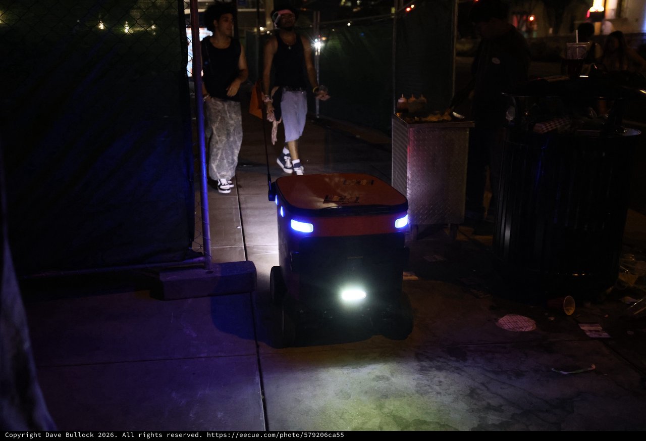 Autonomous Delivery Robot Navigates Nighttime Festival Crowd
