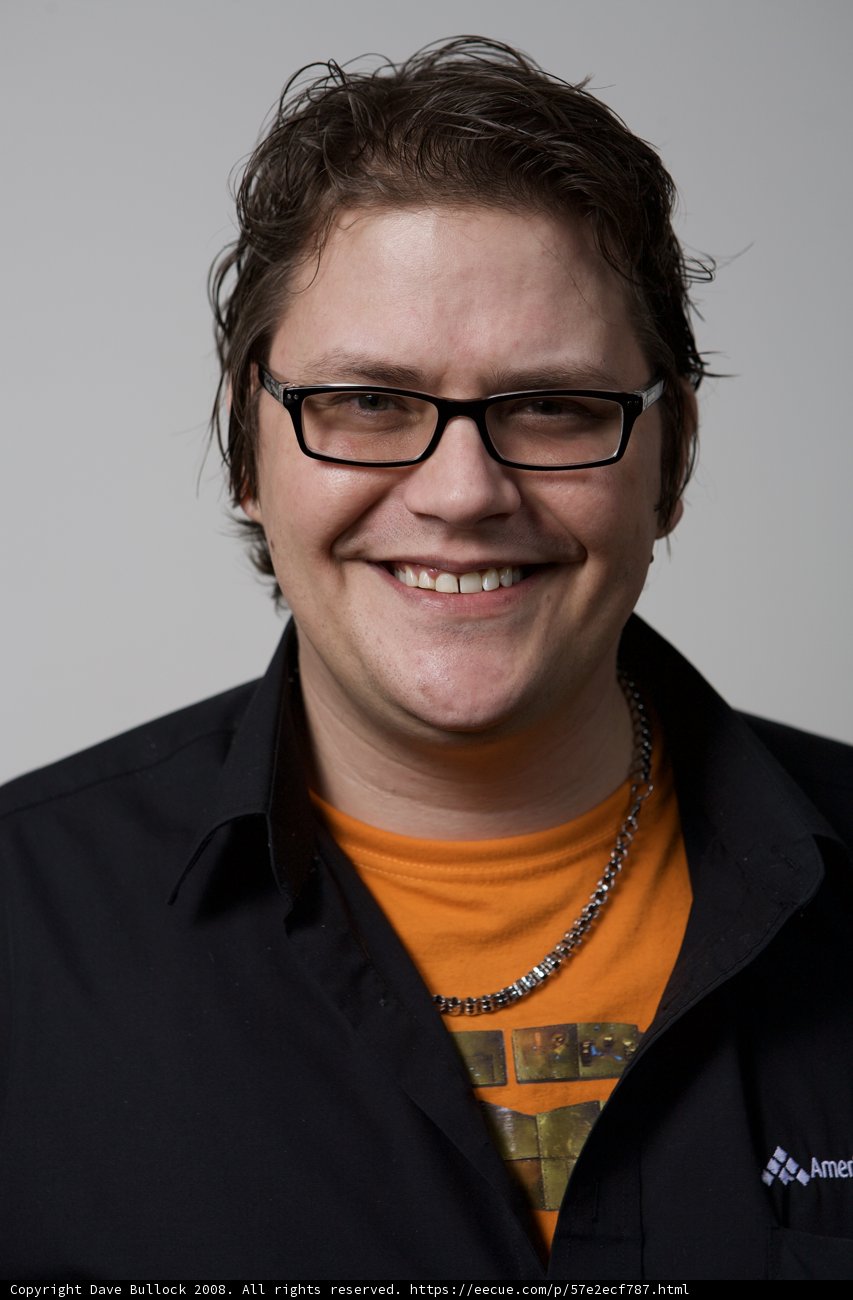 The Happy Man in Black Glasses