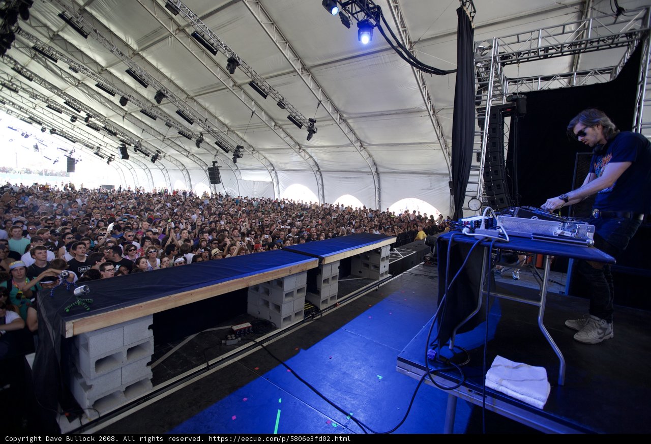 Man Playing Music for Enthralled Crowd at Coachella Music Festival