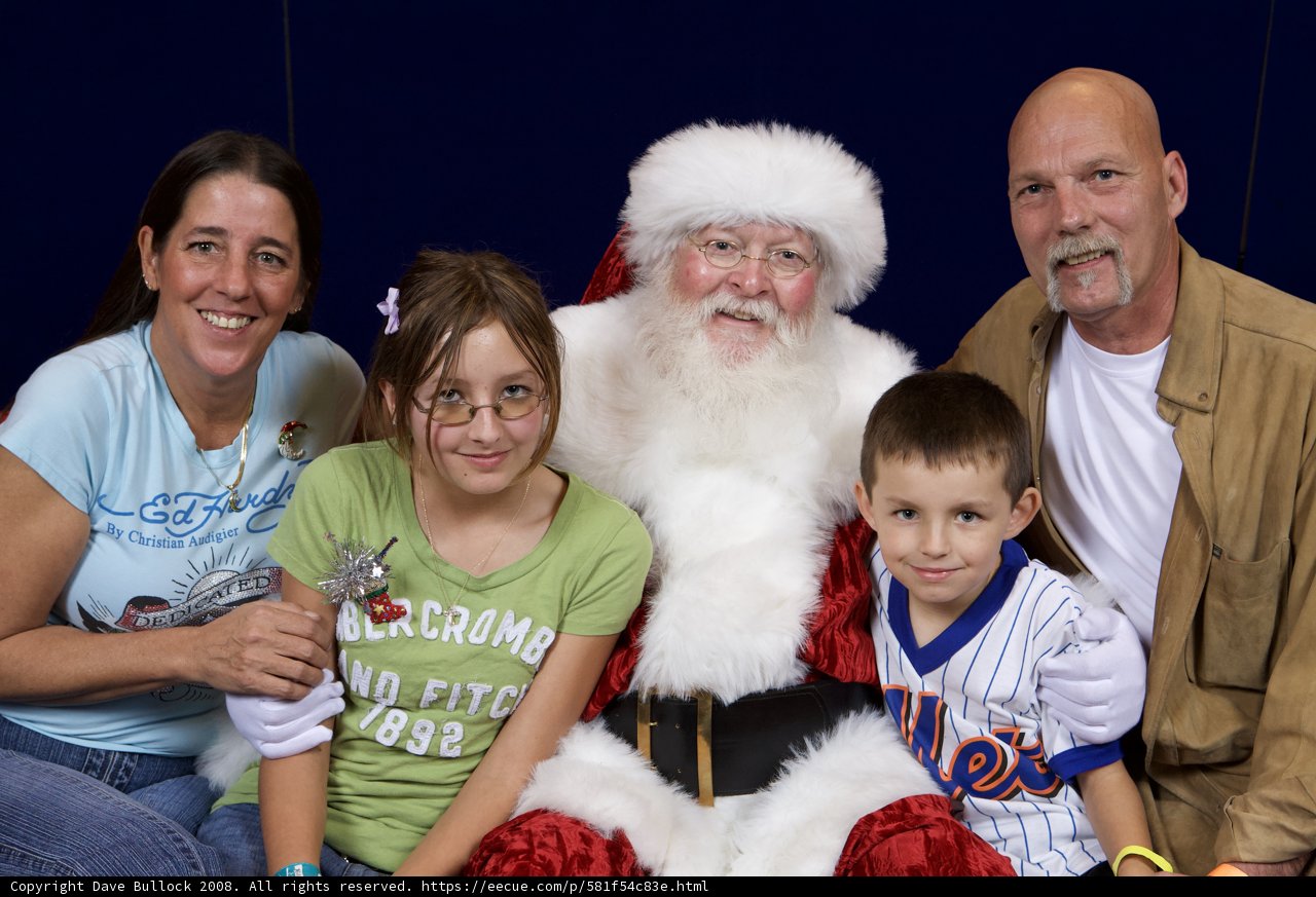 A Heartwarming Christmas Moment with Santa and the Family