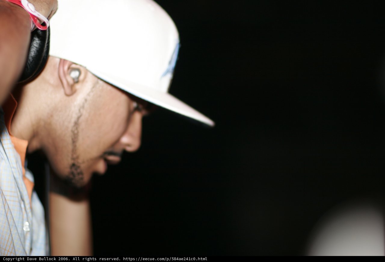 Craze in Headphones and a Cap