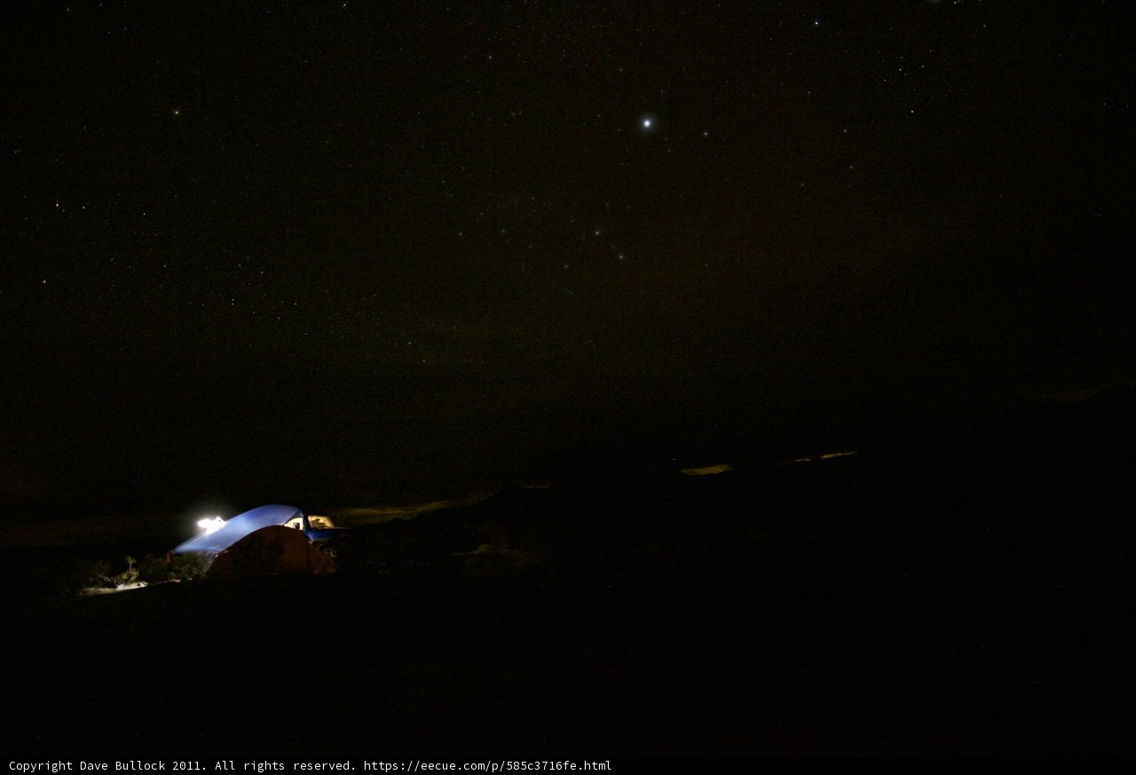 Mountain Tent under Starry Night Sky