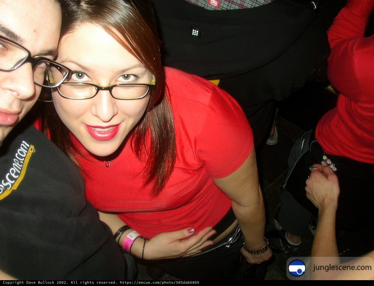 Red-Shirted Couple Strikes a Pose