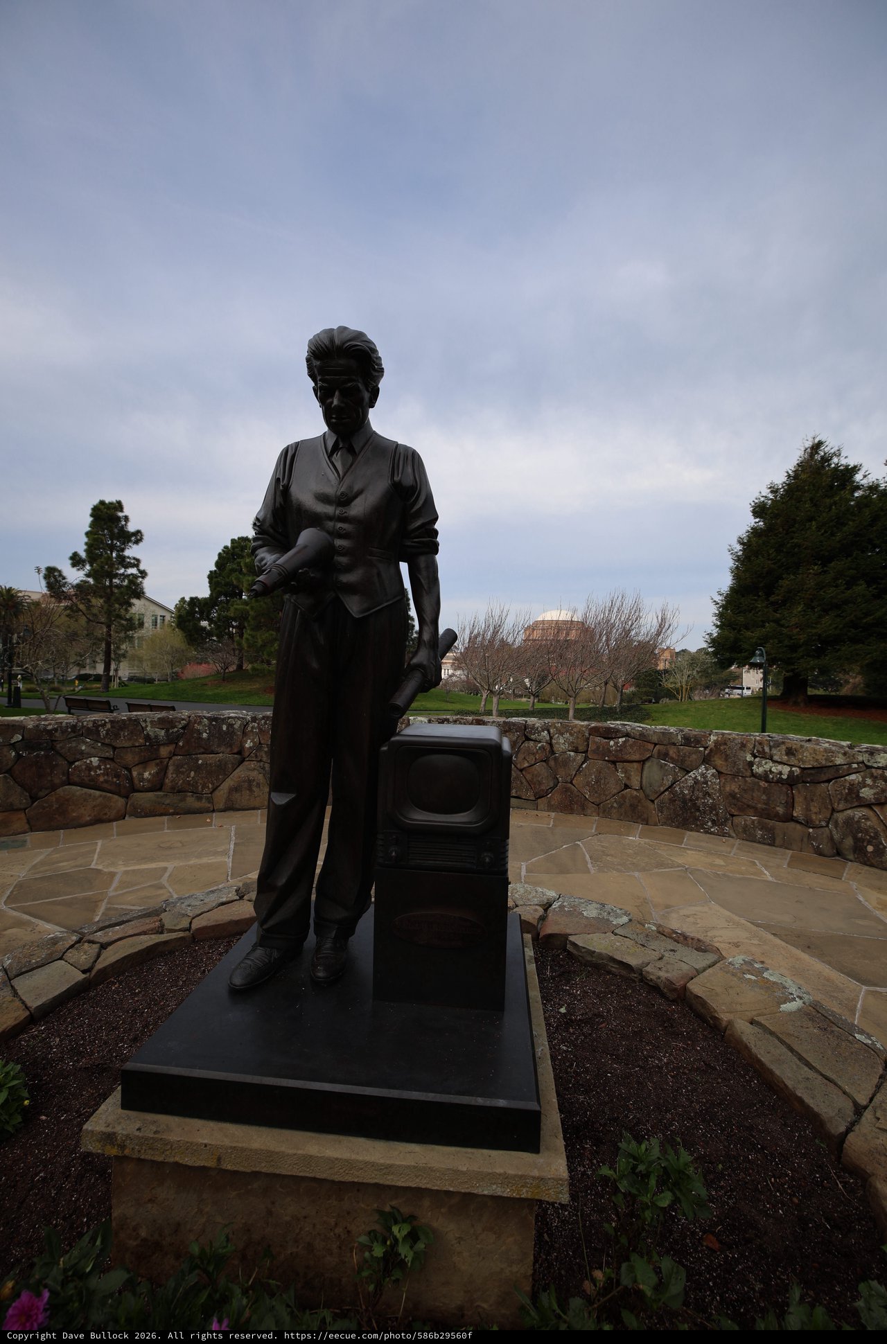 Bronze Statue of Woman with Suitcase at Memorial