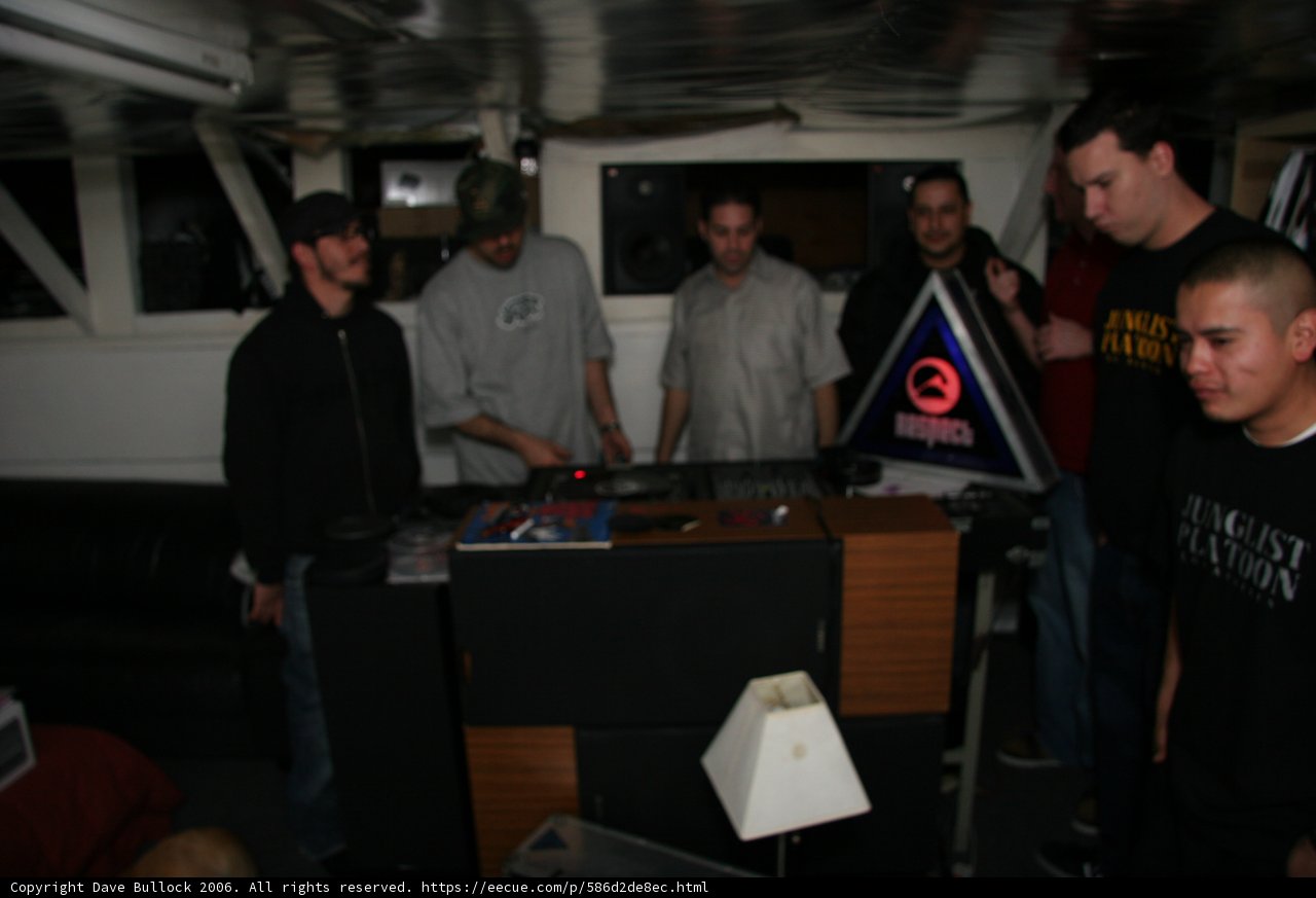 DJs spinning tunes for group of friends at pub