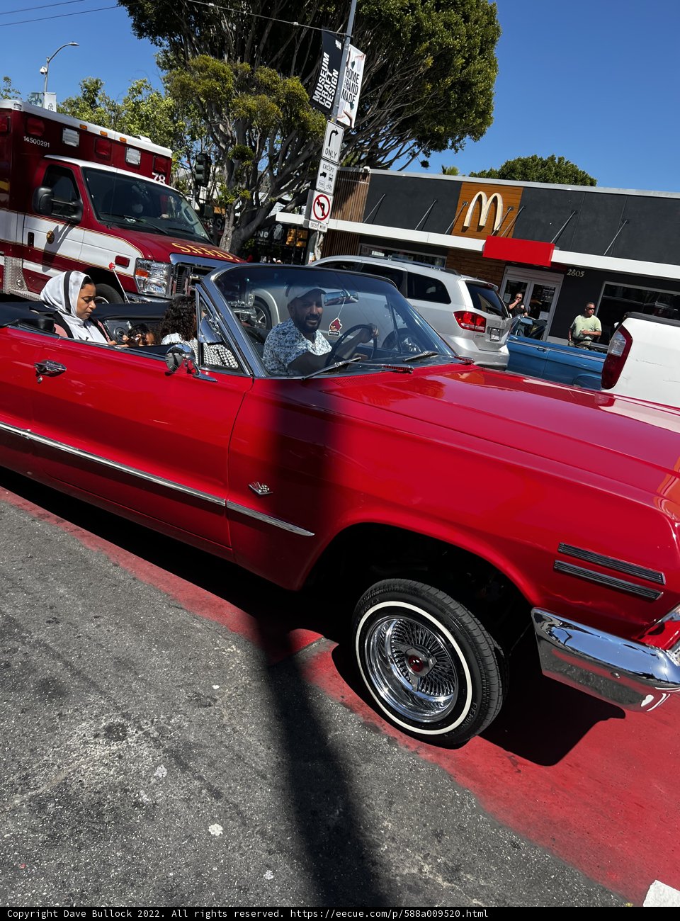 Red Convertible Riding in Style