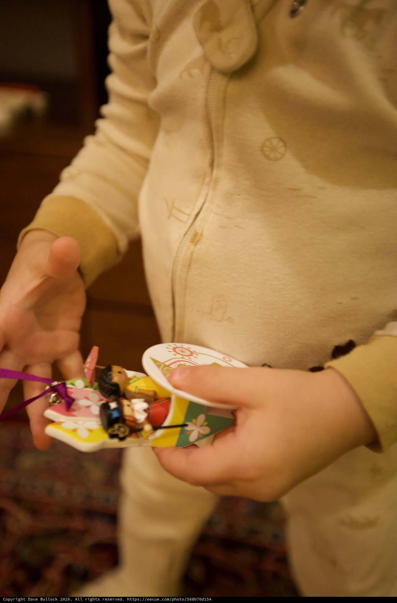 Child Holding Handmade Christmas Ornament Plate