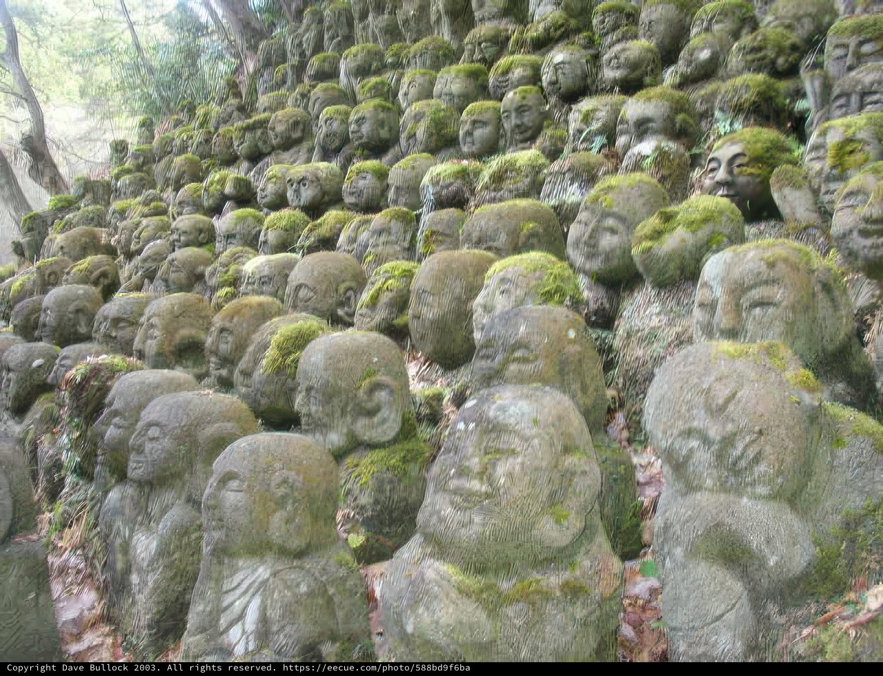 Moss-Covered Statues at Kyoto City Hall