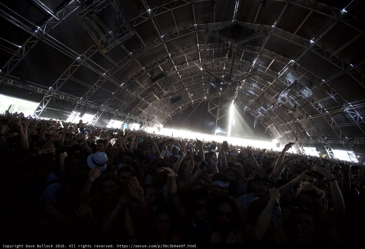 Concertgoers at Coachella Raise Hands in the Air