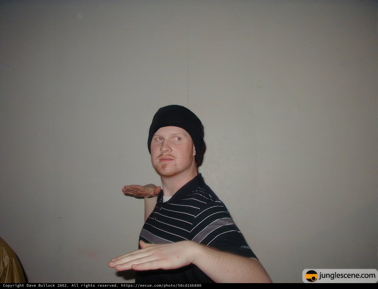 Stylish Man in Black Shirt and Beanie