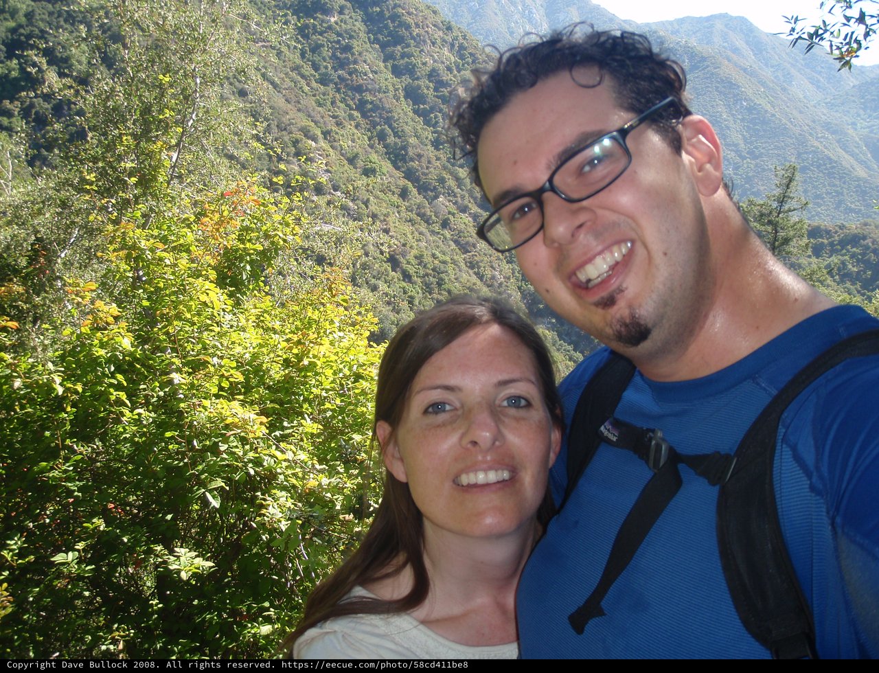 Couple Smiling on Mountain Hiking Trail