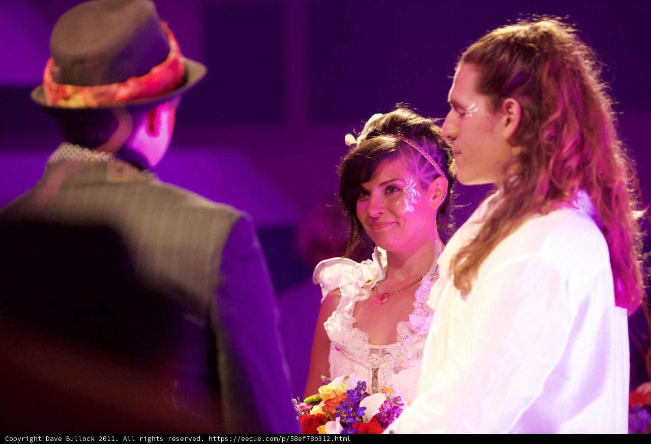 The Beautiful Bride and Groom with Flower Arrangement