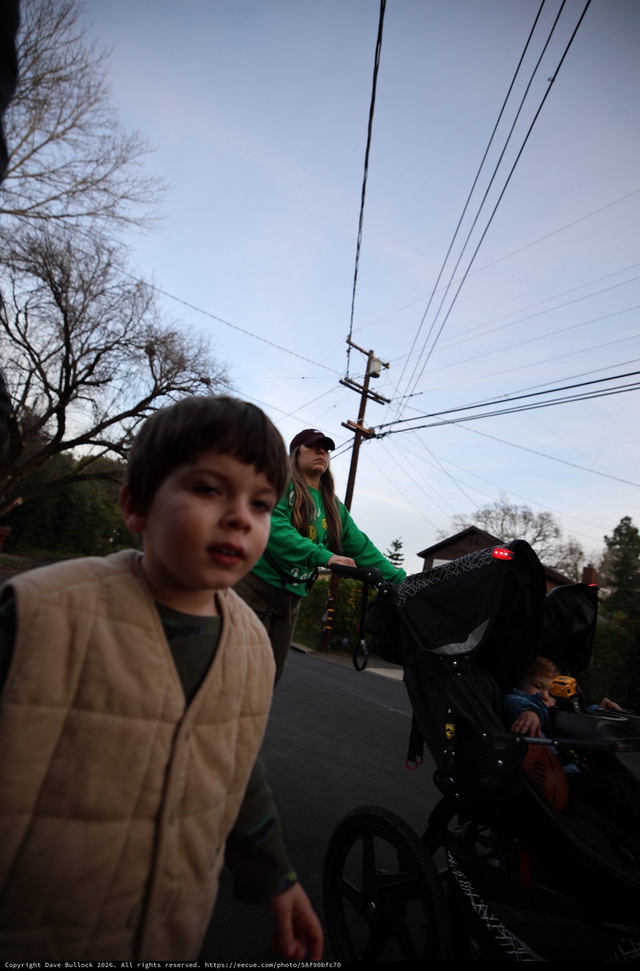 Family Evening Bike Ride on Suburban Street