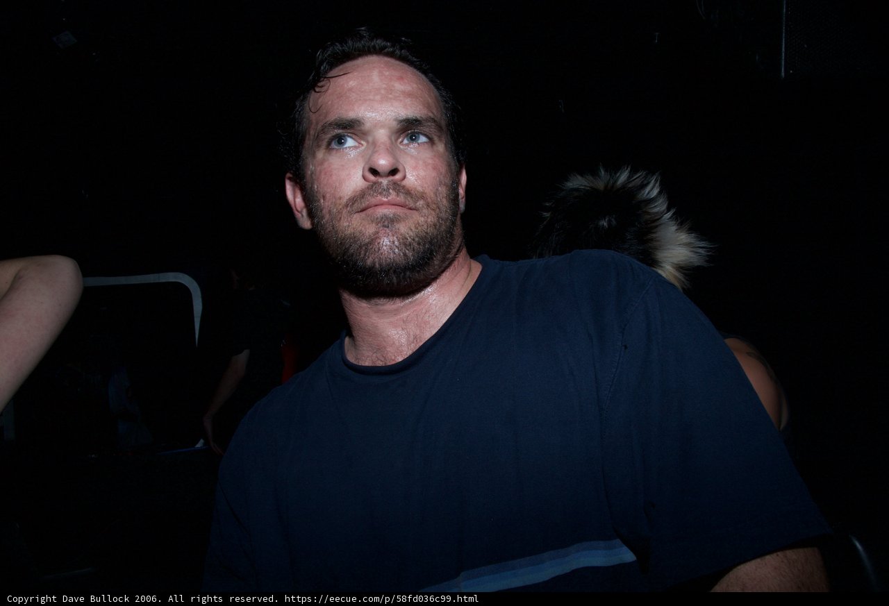 Blue Shirted Bearded Man