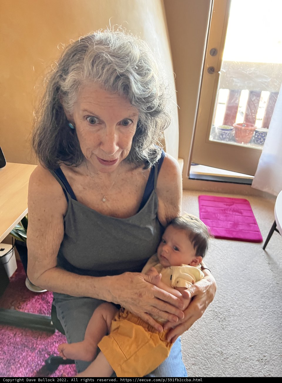 A Portrait of Love: Rhoda B Holding a Baby