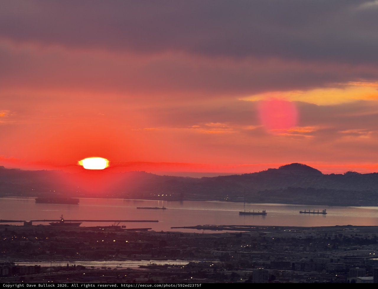 Golden Sunset Over San Francisco Bay with Cargo Ships