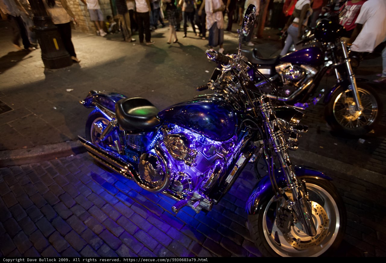 Parked Motorcycle on a Cobblestone Road