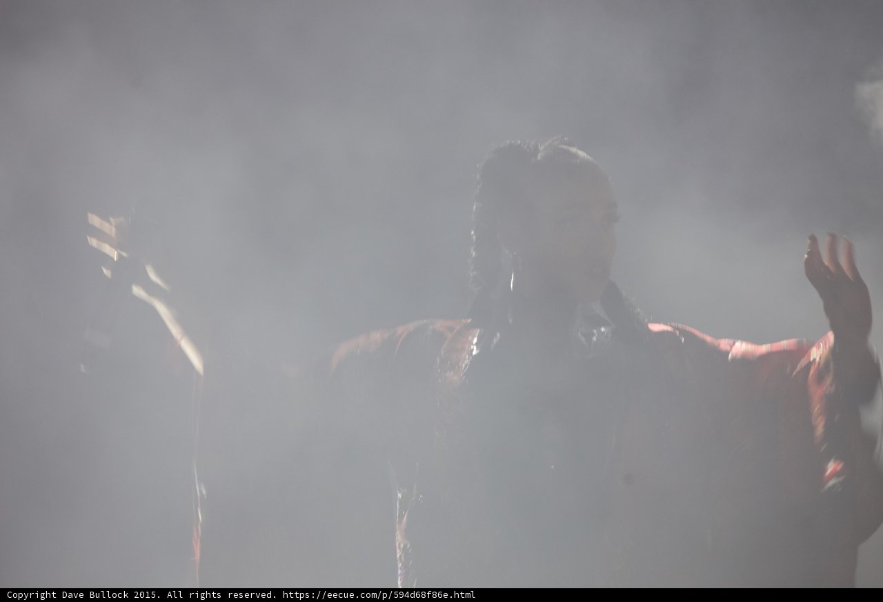 FKA twigs Close Up Silhouette Arms Spread Heavy White Haze Expressive Hands Profile Braids Red Kimono Wings