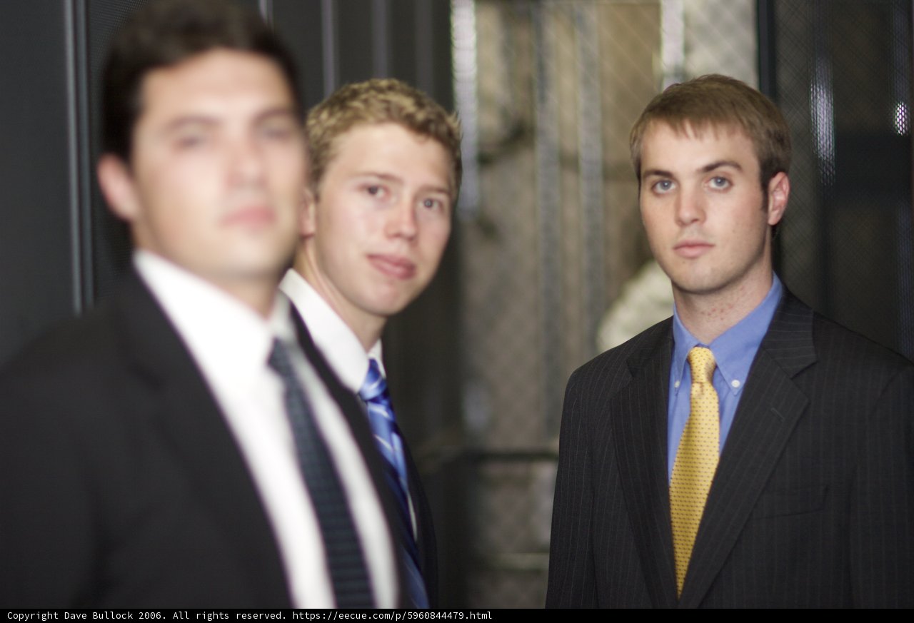 Three Dapper Men in Suits