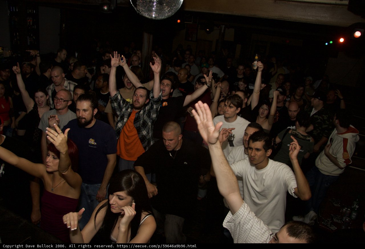 Partygoers Raise the Roof Under the Disco Ball