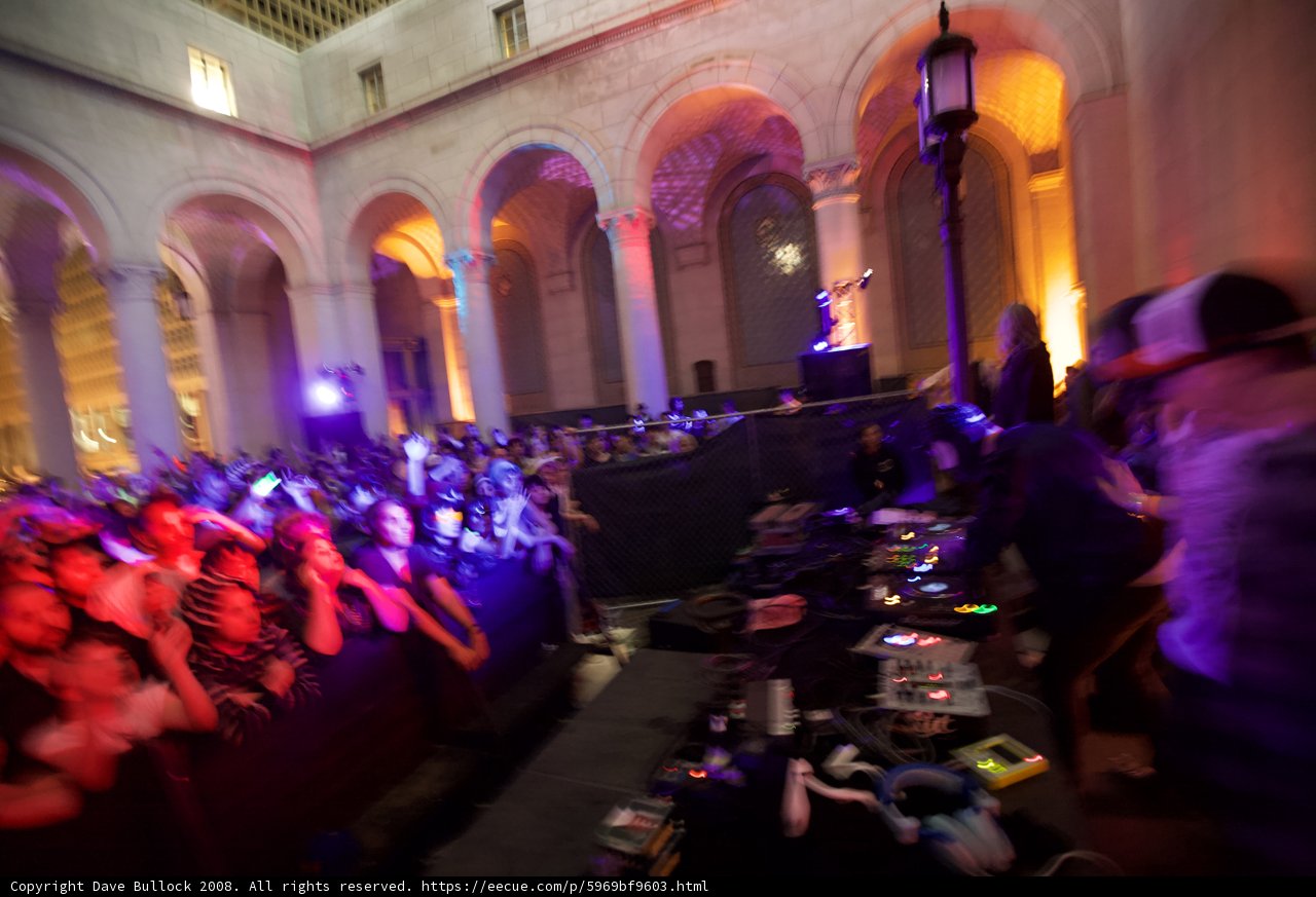 Urban Nightlife: A Crowd Grooves to the DJ's Beat