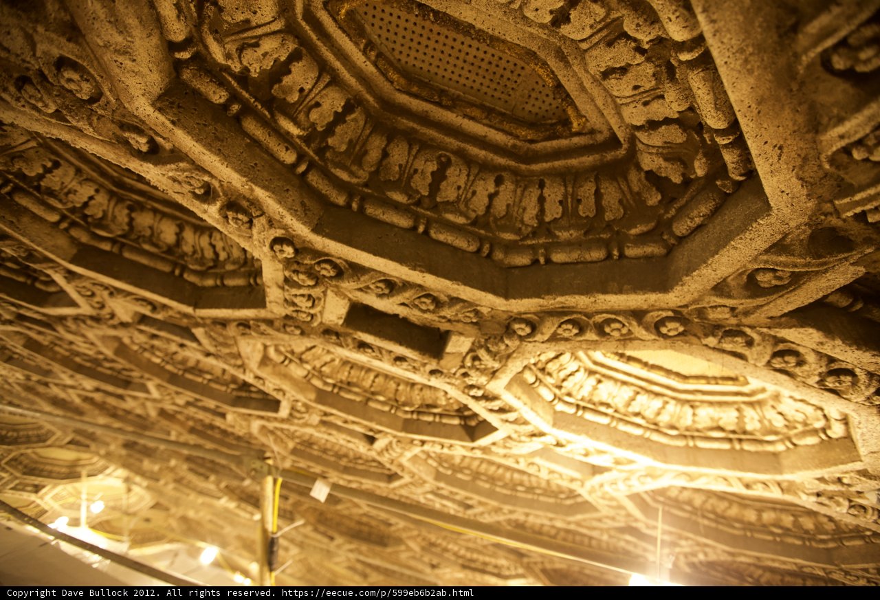 Intricate Carvings on the Ceiling of a Building
