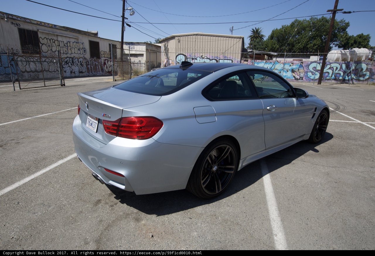 Sporty BMW M4 Coupe in a Graffiti Parking Lot