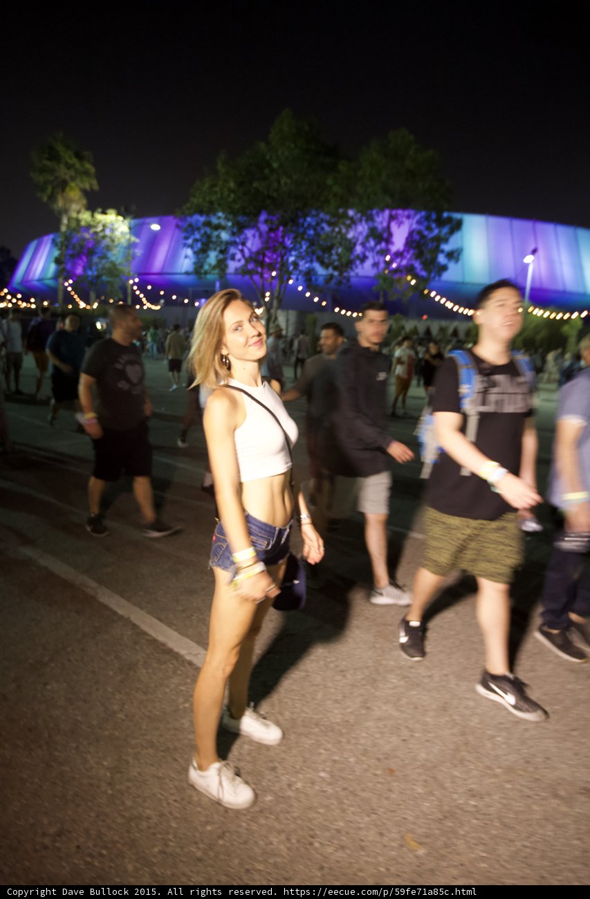 Woman Smiling Arena Behind