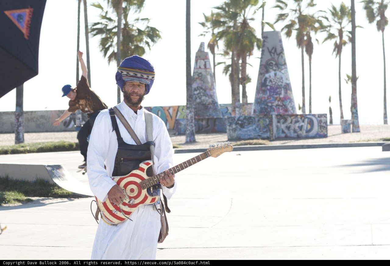 Musician in Turban Strums a Groove