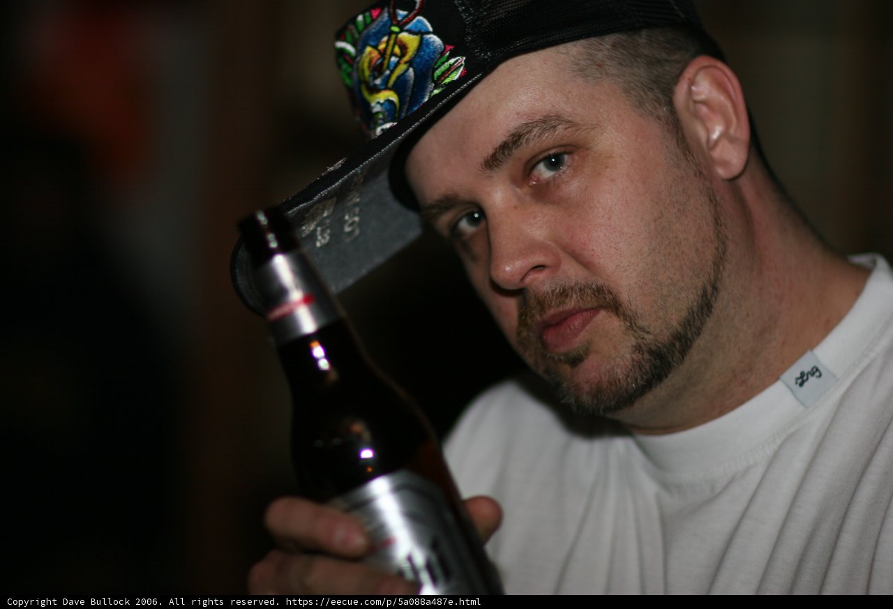 The Hat-Wearing Beer Drinker