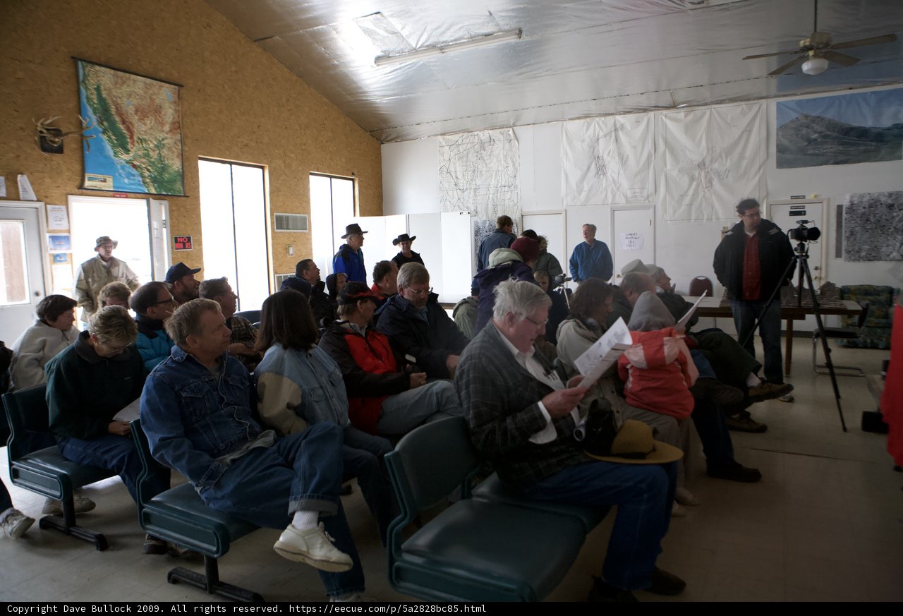 Impatient Audience Waits in Crowded Room